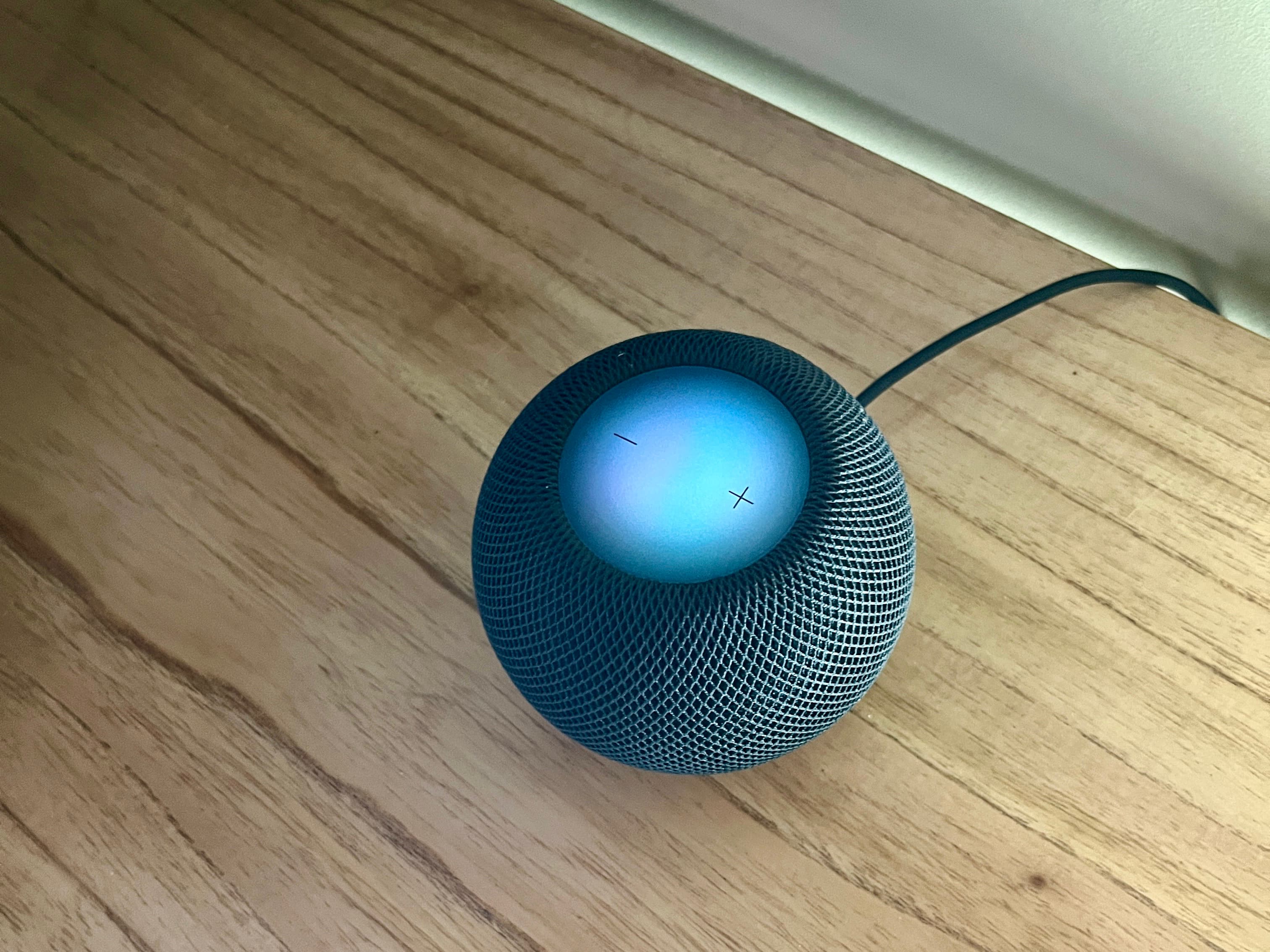 My workspace setup with Mac mini and HomePod mini